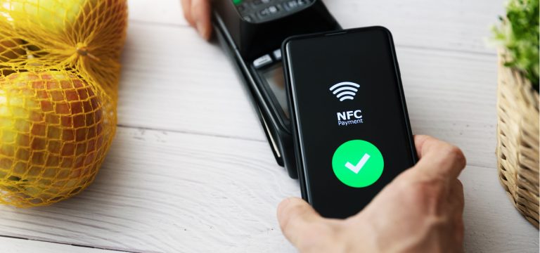 NFC-payment-success-with-mobile-at-the-cash