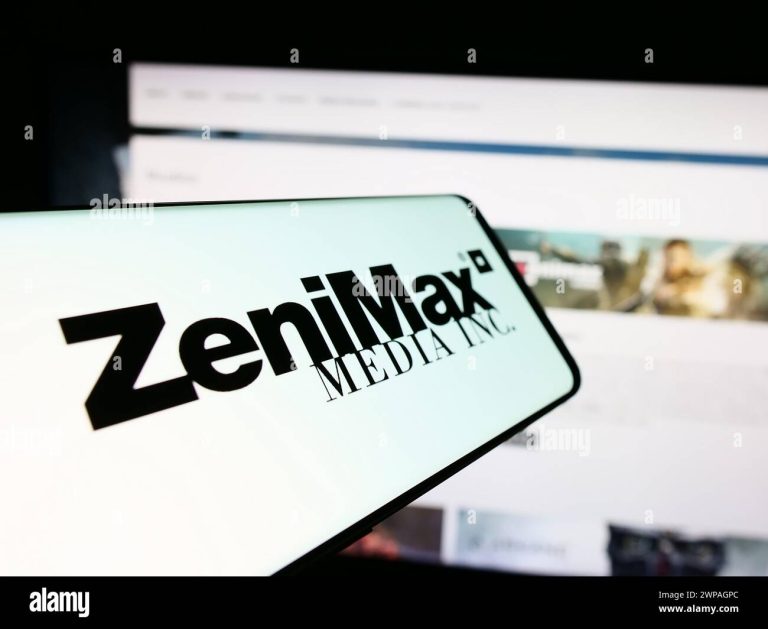 mobile-phone-with-logo-of-american-video-game-company-zenimax-media-inc-in-front-of-business-website-focus-on-center-of-phone-display-2WPAGPC